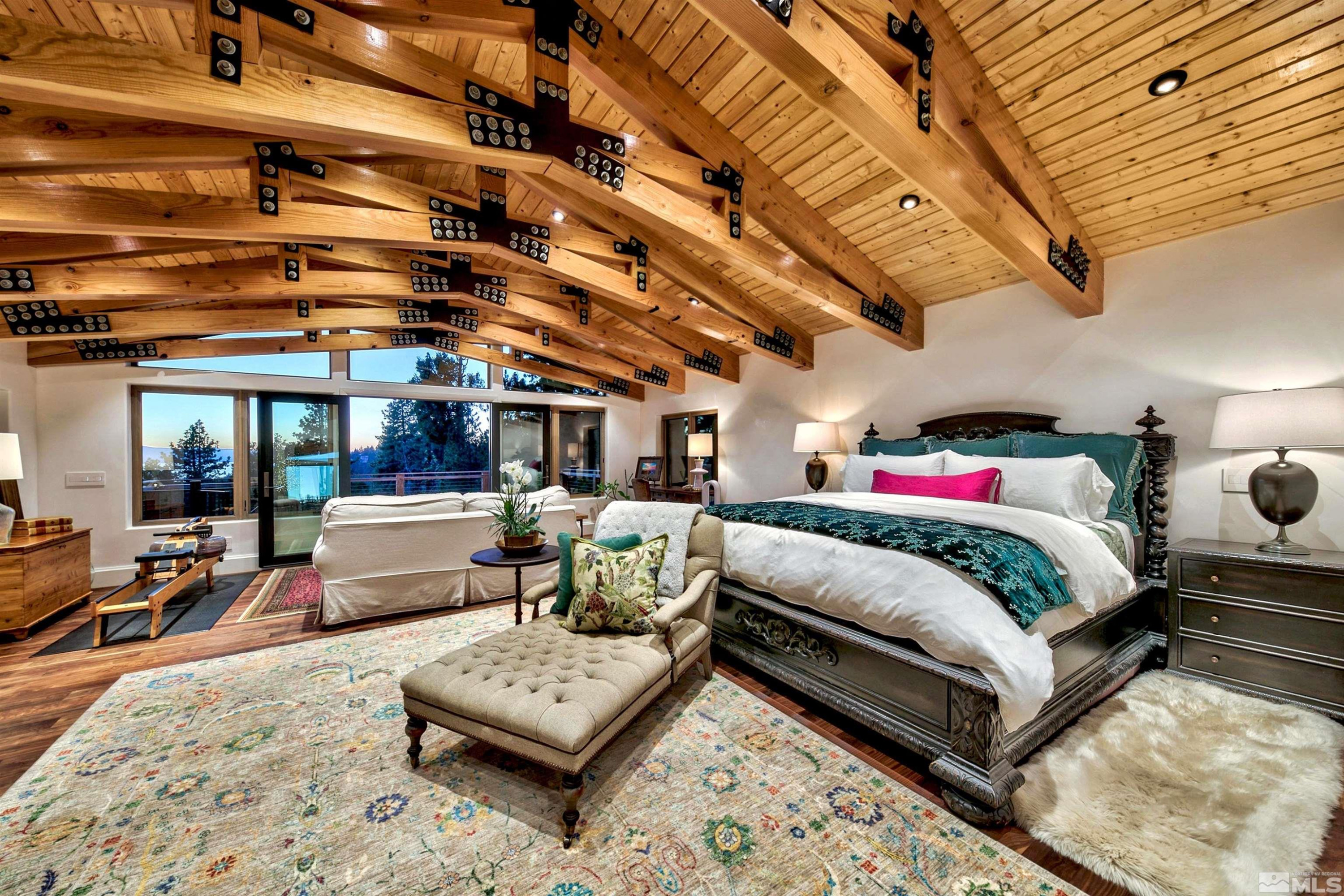 340 Ute Way Stateline, NV 89449 - Photo 31 of 40 a bed room with bed and a couch