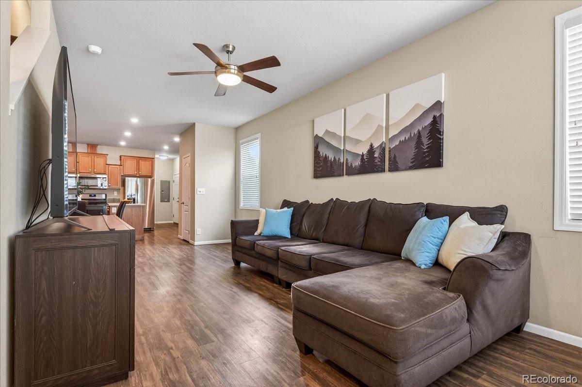 53 Brook Trout Loop Gypsum, CO 81637 - Photo 5 of 38 a living room with furniture and a wooden floor