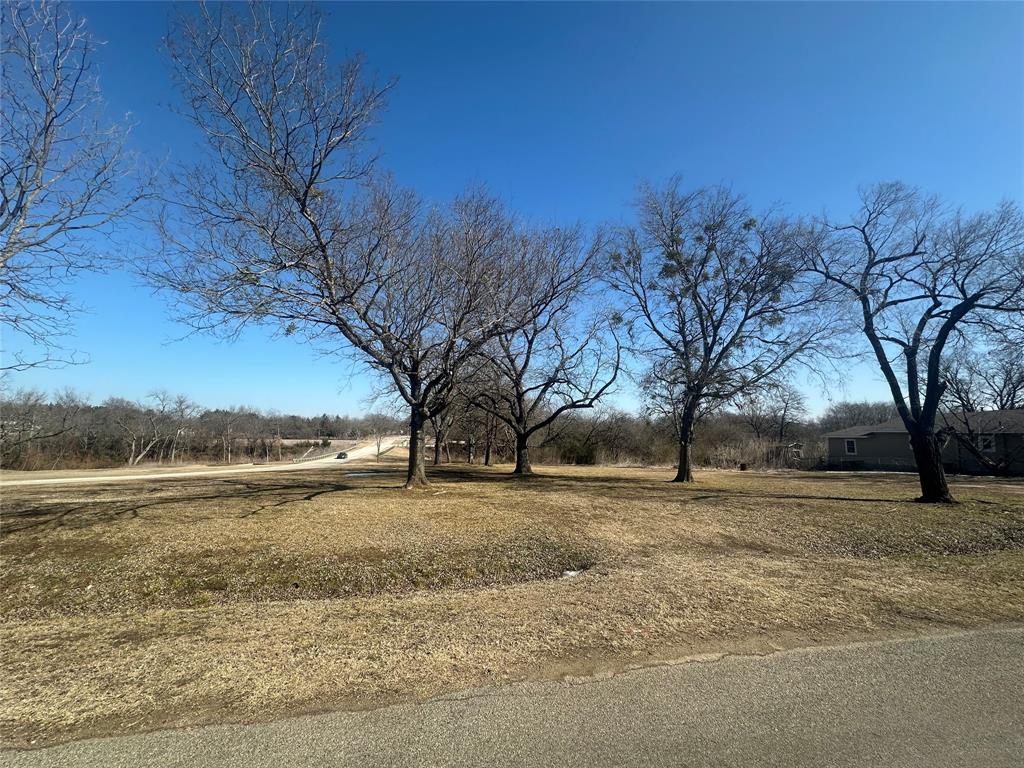 C South Inwood Street Sherman, TX 75090 - Photo 3 of 3 a view of dirt yard with a tree
