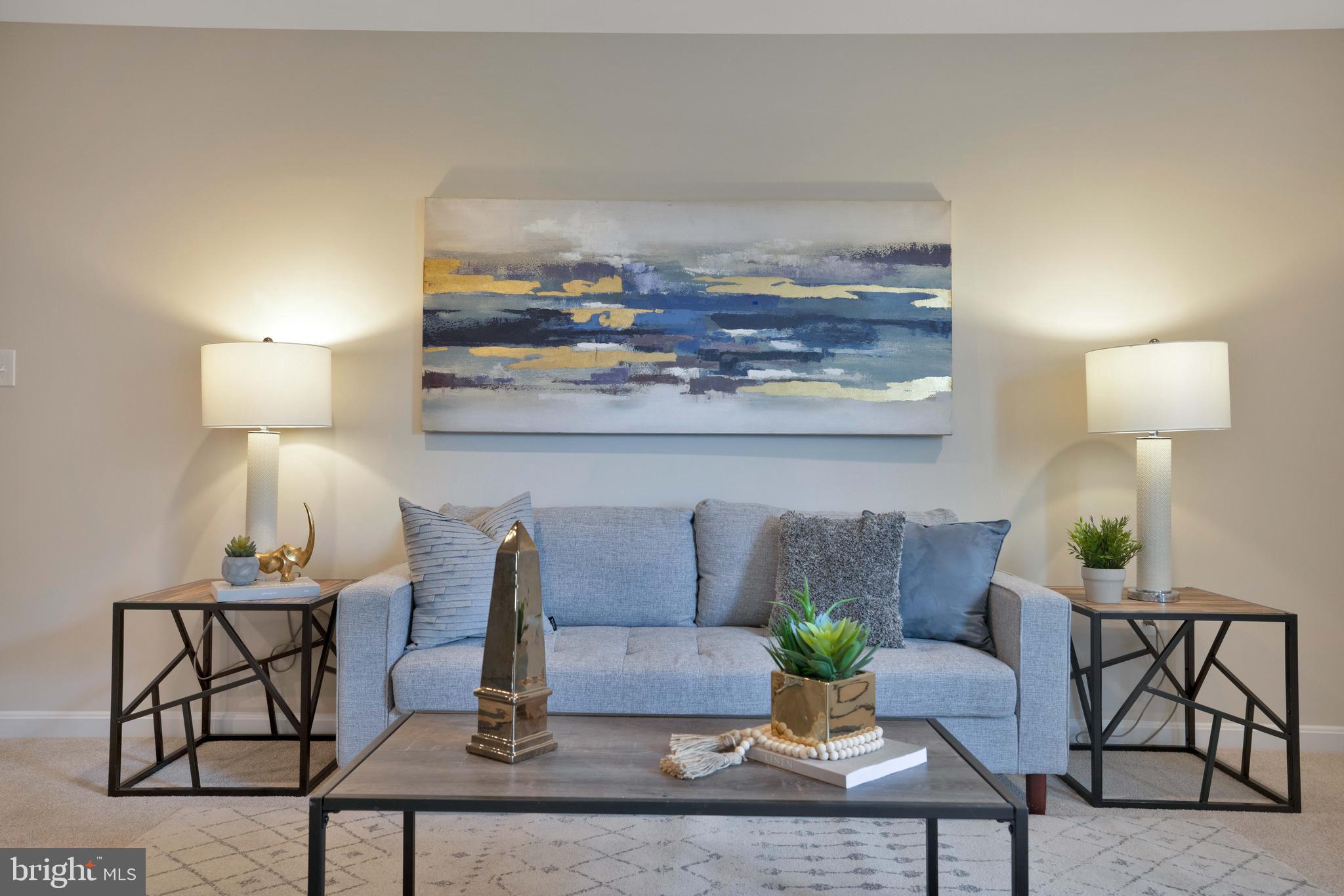 2417 Elvans Road Southeast Washington, DC 20020 - Photo 12 of 48 a living room with furniture and lamp