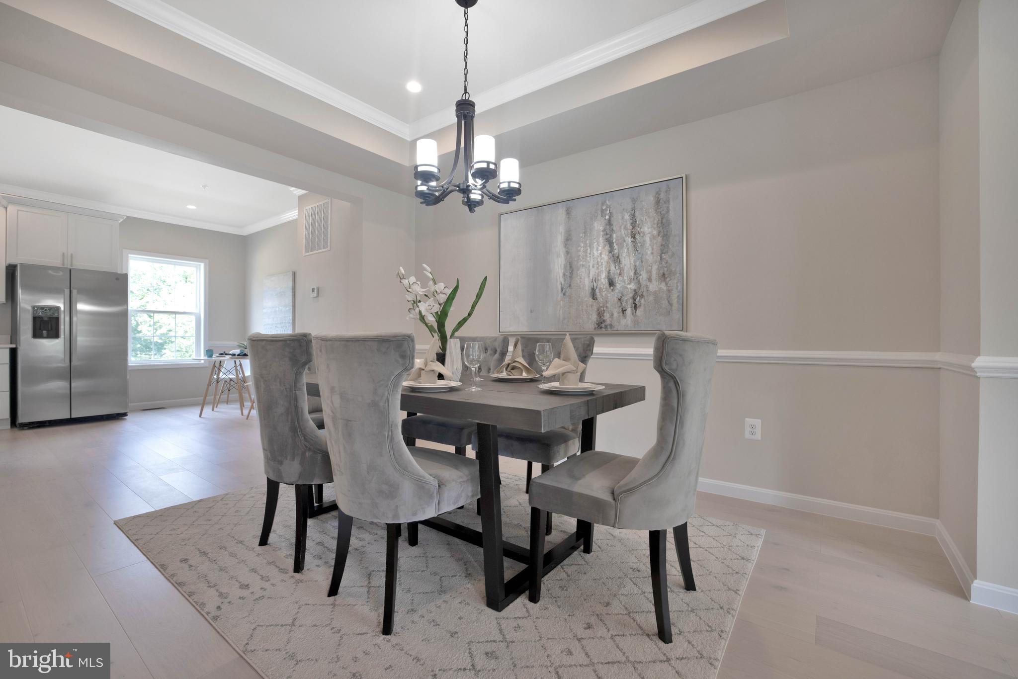2417 Elvans Road Southeast Washington, DC 20020 - Photo 14 of 48 a view of a dining room with furniture and wooden floor