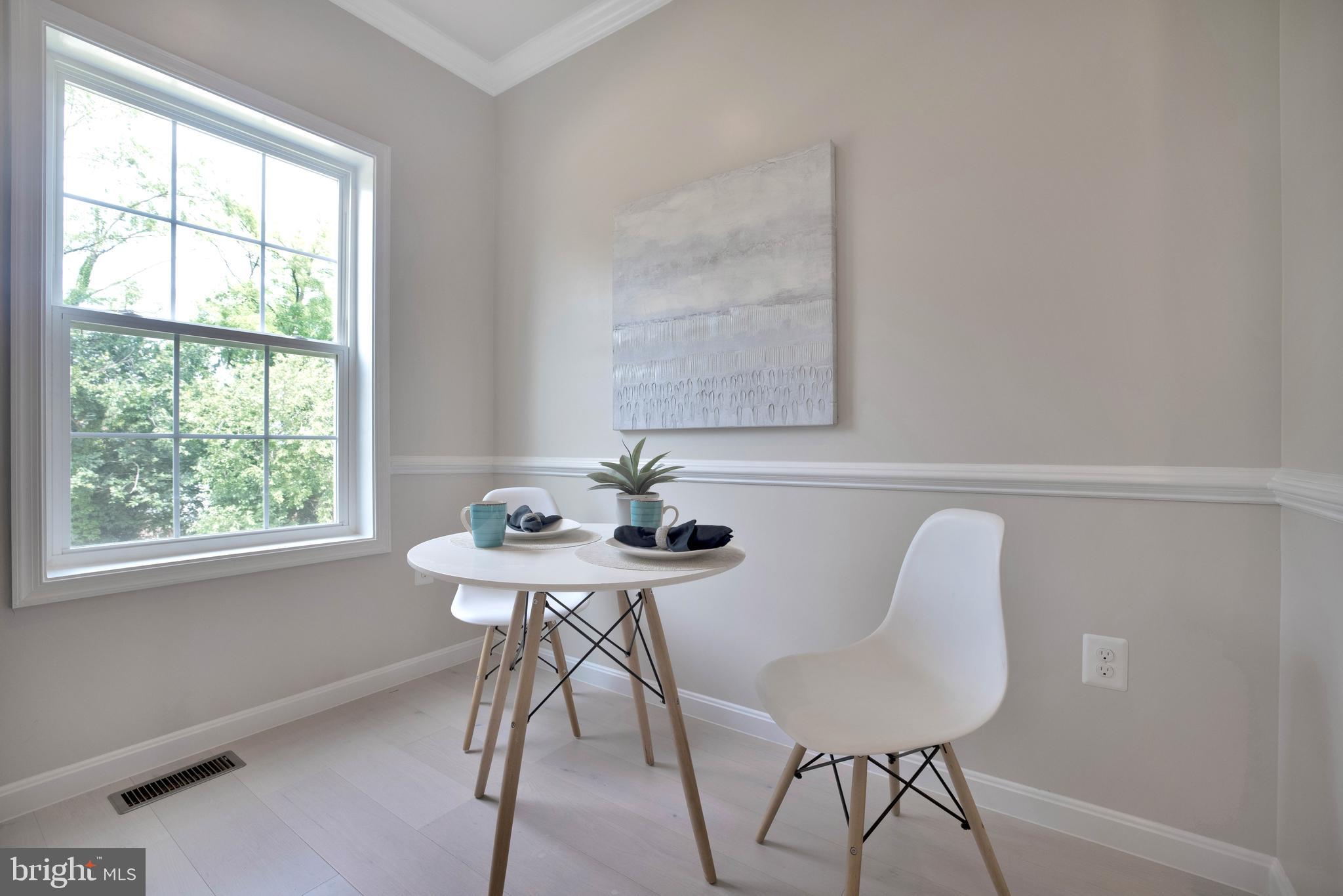 2417 Elvans Road Southeast Washington, DC 20020 - Photo 17 of 48 a view of a dining room with furniture and window