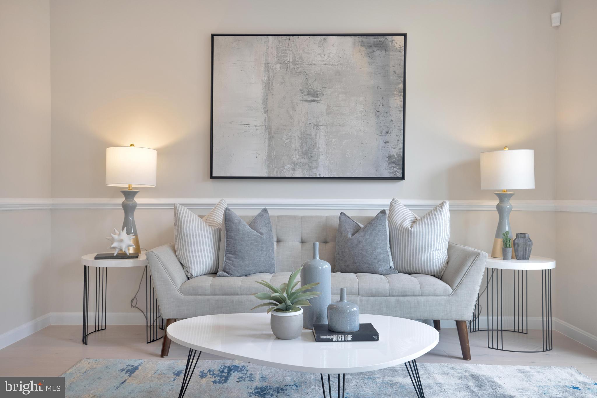 2417 Elvans Road Southeast Washington, DC 20020 - Photo 20 of 48 a living room with furniture and a lamp