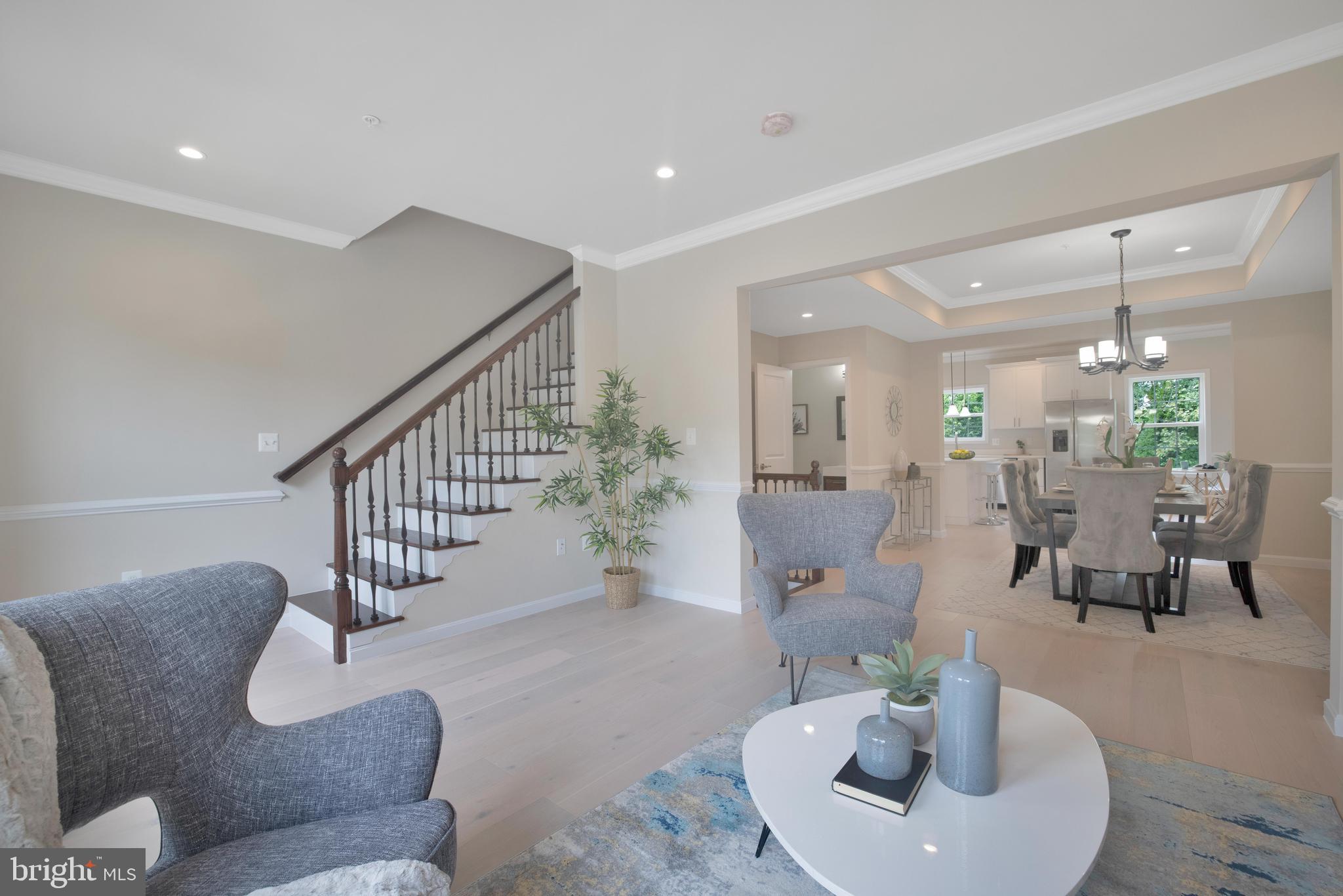 2417 Elvans Road Southeast Washington, DC 20020 - Photo 22 of 48 a living room with furniture and wooden floor