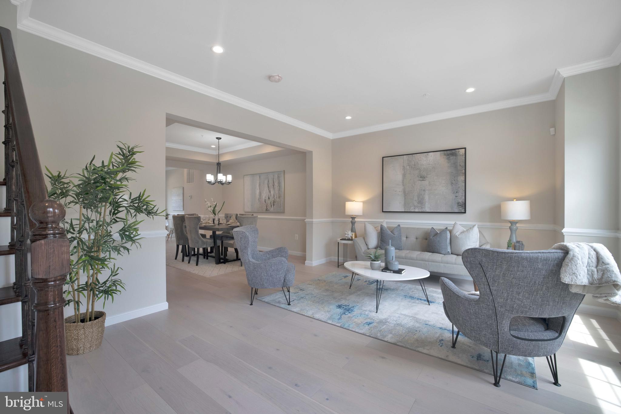 2417 Elvans Road Southeast Washington, DC 20020 - Photo 23 of 48 a living room with furniture and a potted plant