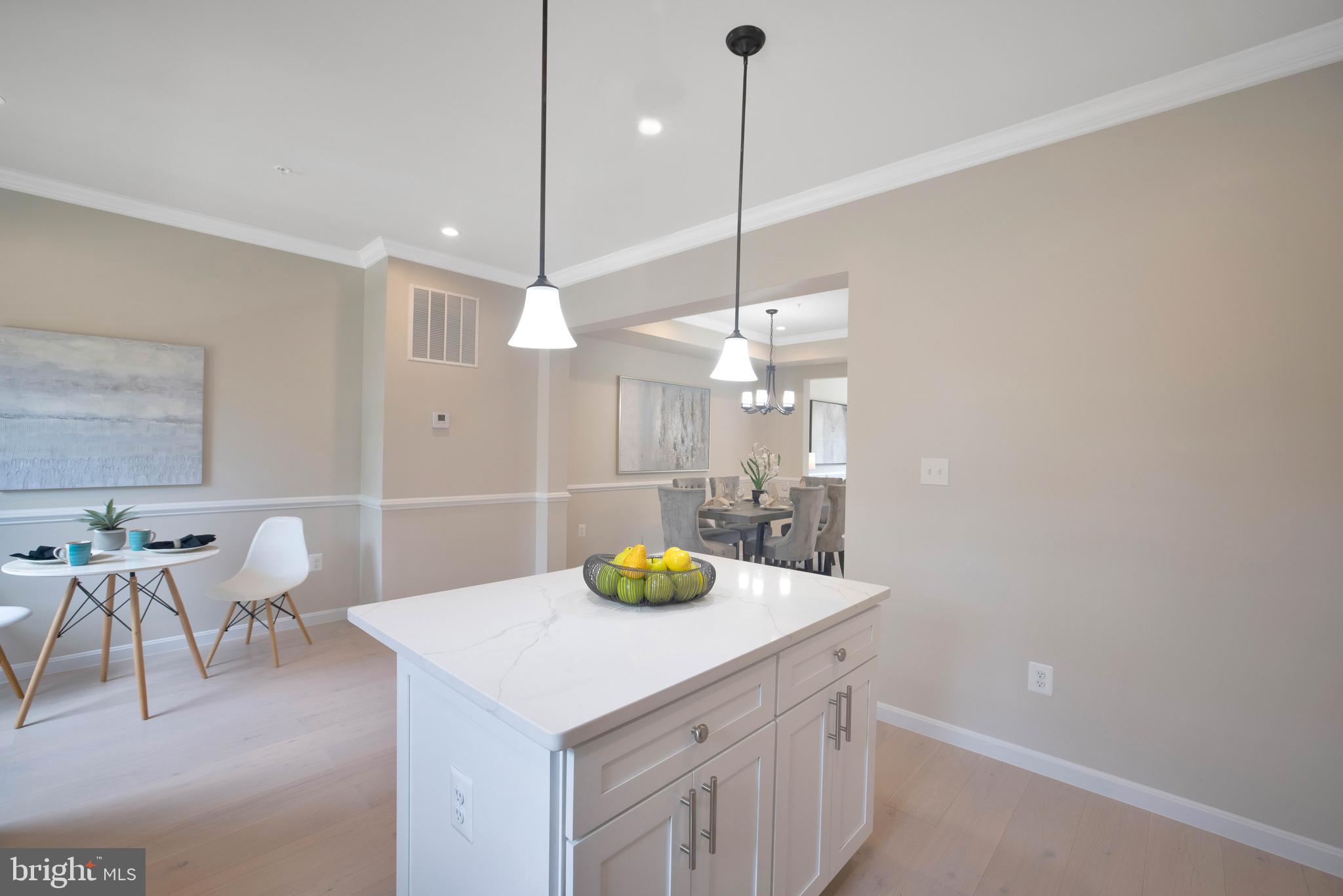 2417 Elvans Road Southeast Washington, DC 20020 - Photo 29 of 48 a bathroom with a sink a table and chairs