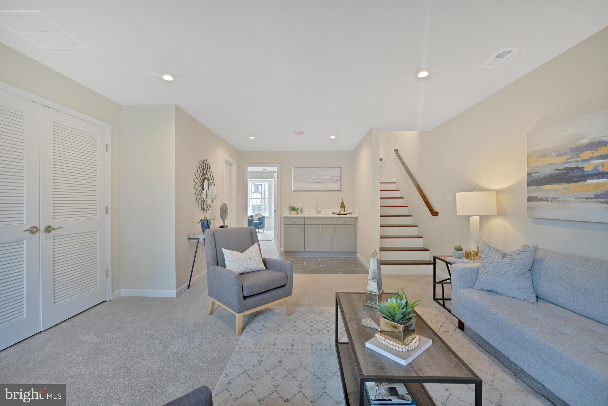 2417 Elvans Road Southeast Washington, DC 20020 - Photo 4 of 48 a living room with furniture and wooden floor