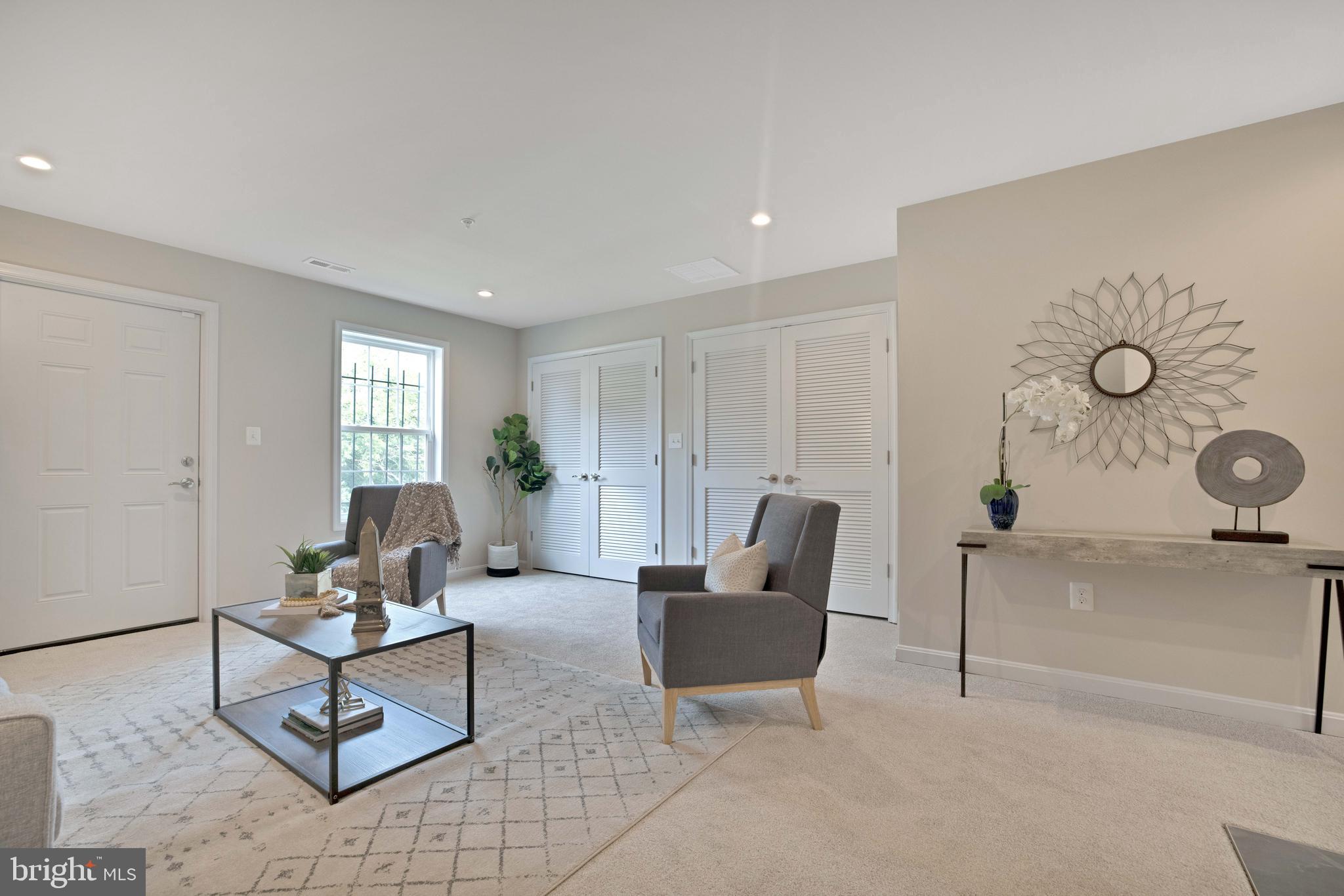 2417 Elvans Road Southeast Washington, DC 20020 - Photo 6 of 48 a living room with furniture and wooden floor