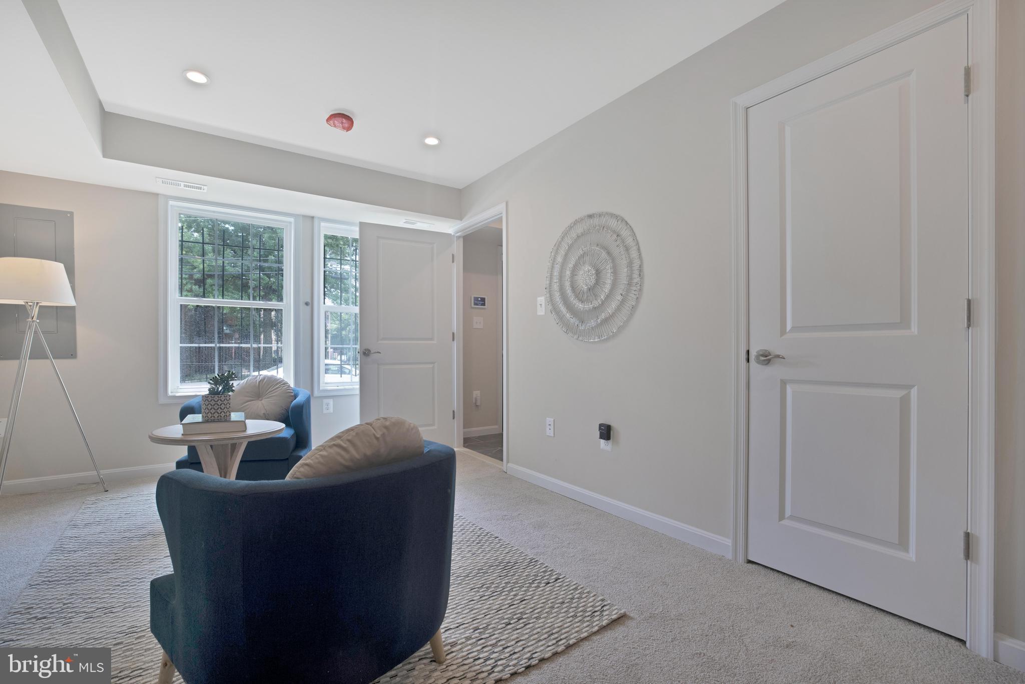 2417 Elvans Road Southeast Washington, DC 20020 - Photo 8 of 48 a living room with furniture and a window