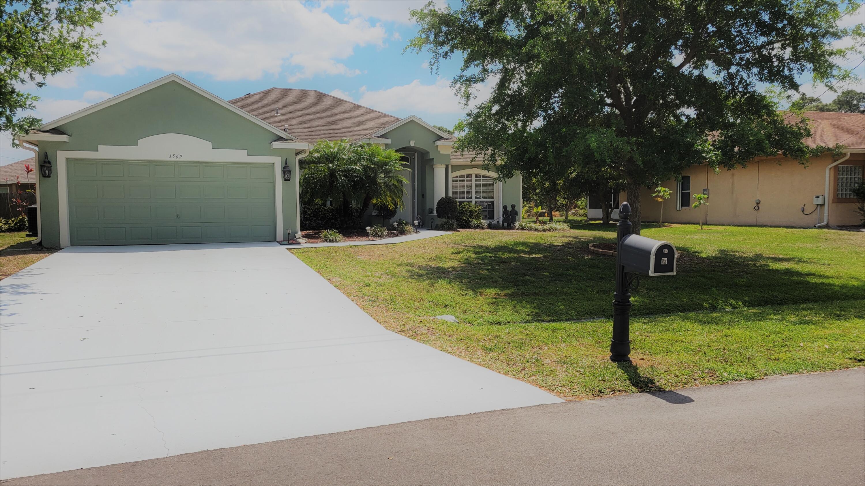 1562 Southwest Neponset Road Port St. Lucie, FL 34953 - Photo 1 of 19 Front view of home