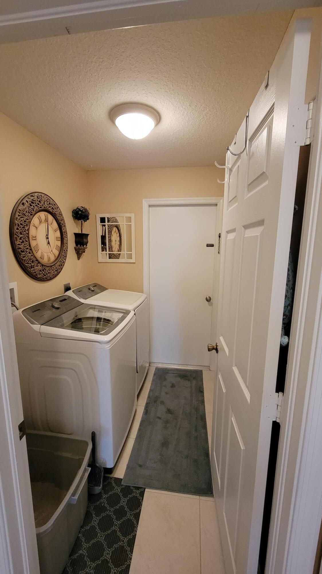 1562 Southwest Neponset Road Port St. Lucie, FL 34953 - Photo 19 of 19 Laundry Room