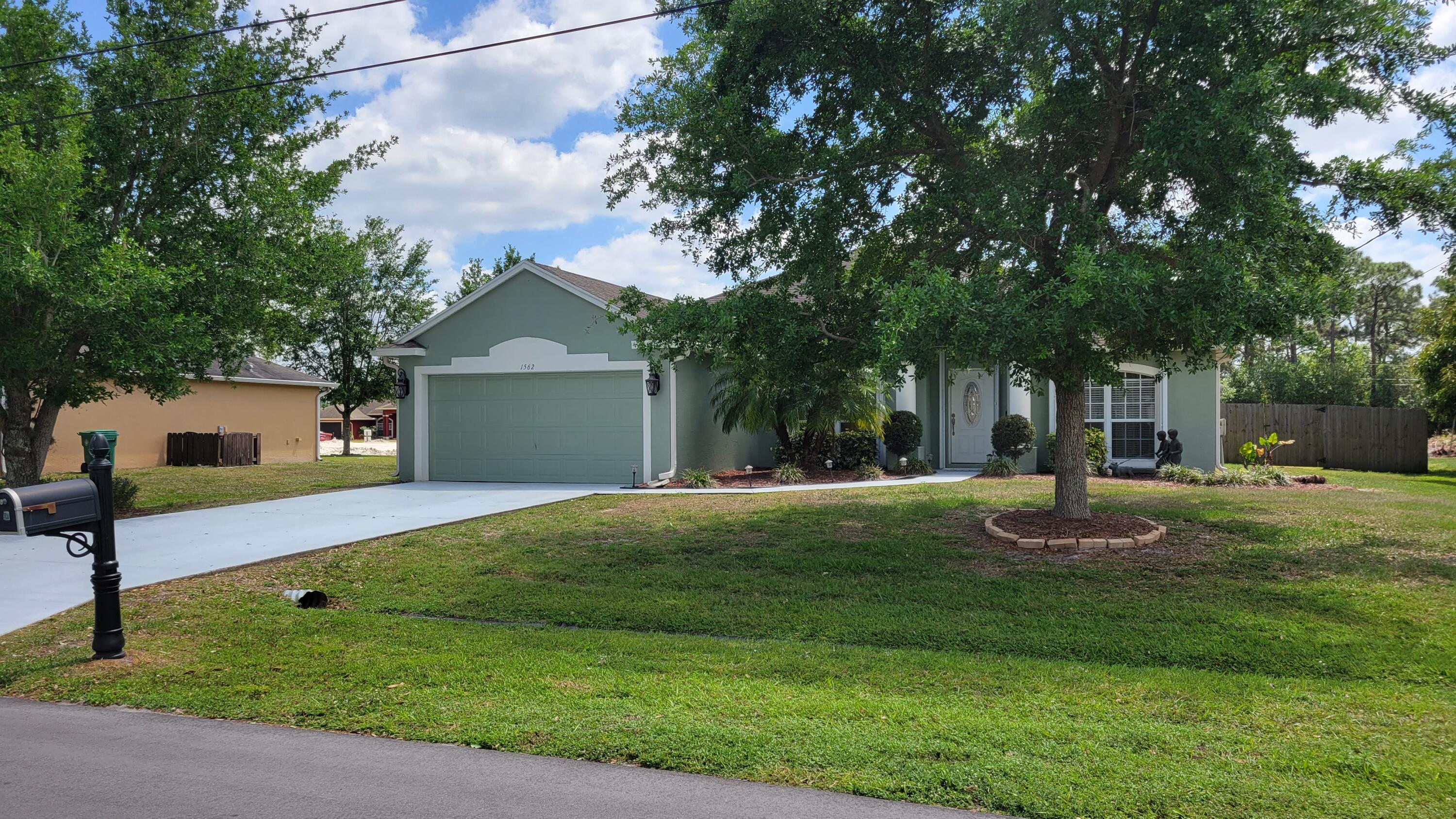 1562 Southwest Neponset Road Port St. Lucie, FL 34953 - Photo 2 of 19 Front of house (2)
