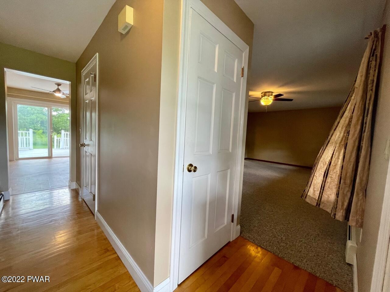 524 Creamton Drive Prompton, PA 18456 - Photo 11 of 57 a view of hallway with wooden floor