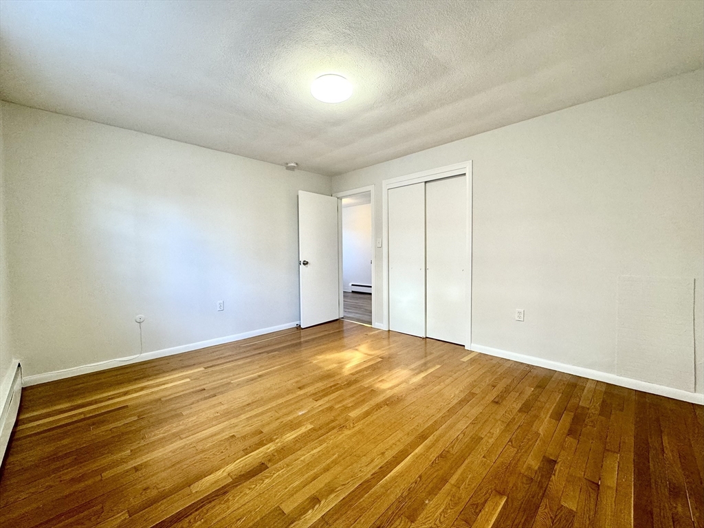 206 High Street, Unit 1 Waltham, MA 02453 - Photo 8 of 16 a view of an empty room