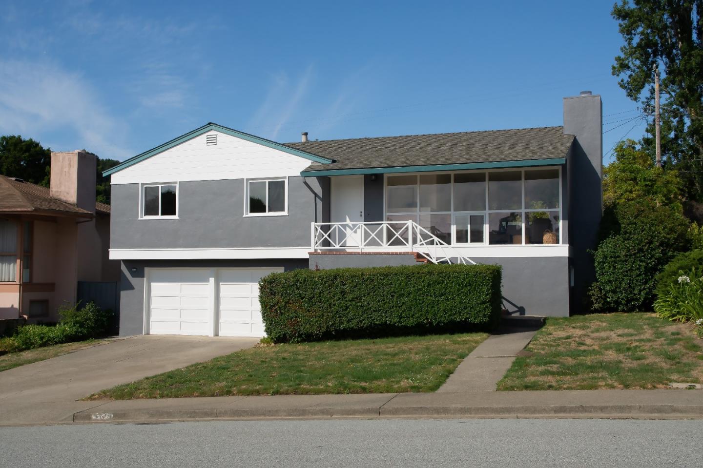 1179 Glenwood Drive Millbrae, CA 94030 - Photo 1 of 21 a front view of a house with garden