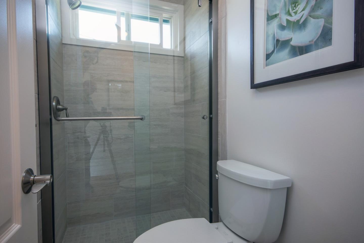 1179 Glenwood Drive Millbrae, CA 94030 - Photo 11 of 21 a bathroom with a toilet and a shower
