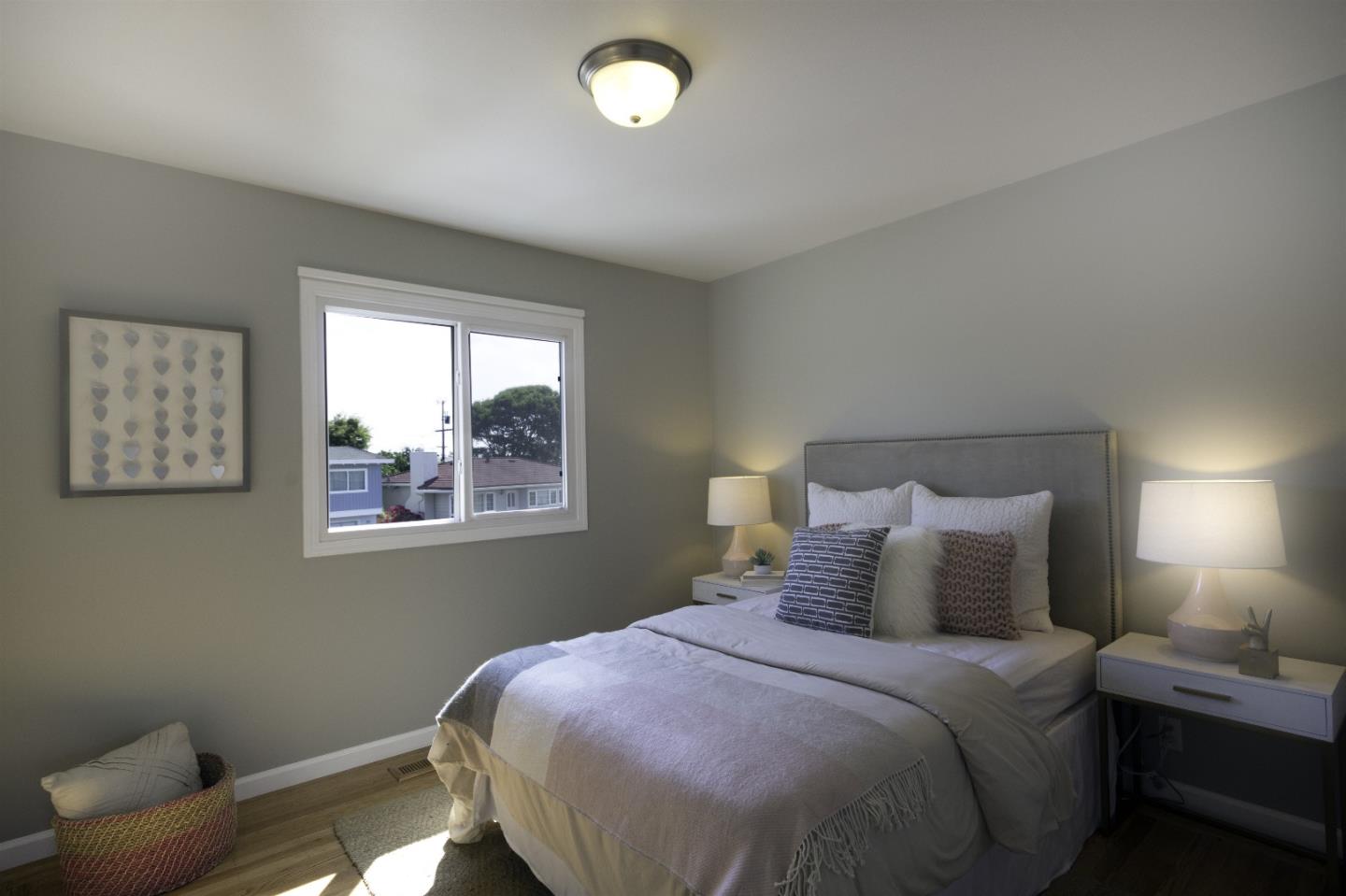 1179 Glenwood Drive Millbrae, CA 94030 - Photo 12 of 21 a bedroom with a bed and a window