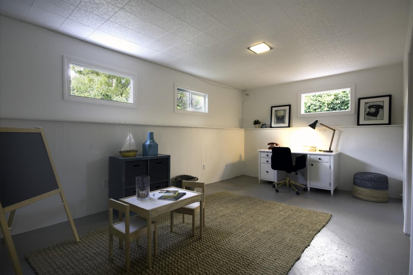 1179 Glenwood Drive Millbrae, CA 94030 - Photo 16 of 21 a living room with furniture a window and a table