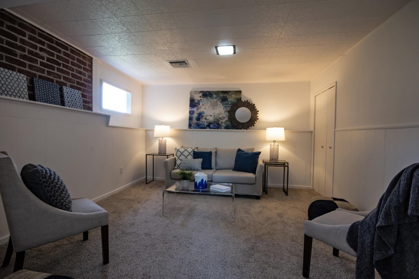 1179 Glenwood Drive Millbrae, CA 94030 - Photo 17 of 21 a living room with furniture and white walls