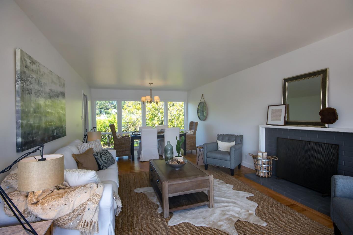 1179 Glenwood Drive Millbrae, CA 94030 - Photo 4 of 21 a living room with furniture and a fireplace