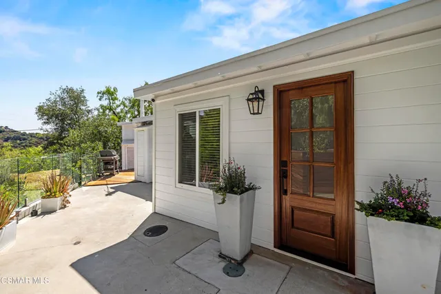 a view of a house with a patio