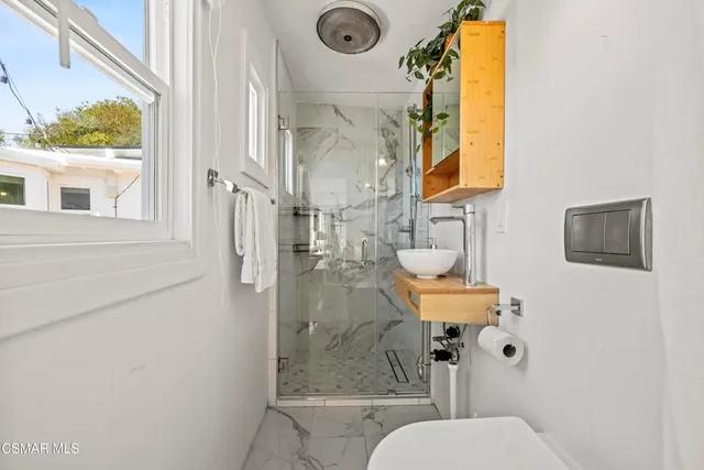 a house with trees in the background