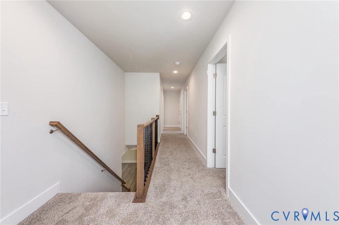 200 Victoria Drive Ruther Glen, VA 22546 - Photo 16 of 30 a view of a hallway with staircase