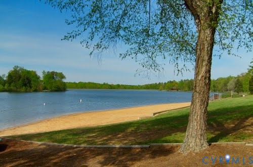 200 Victoria Drive Ruther Glen, VA 22546 - Photo 29 of 30 a view of a lake with a mountain in the background