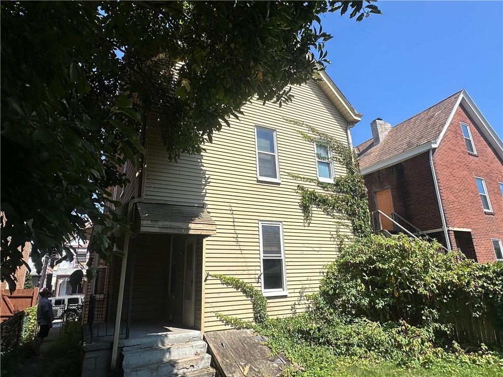 419 2nd Street Pitcairn, PA 15140 - Photo 13 of 15 a view of a house with a yard