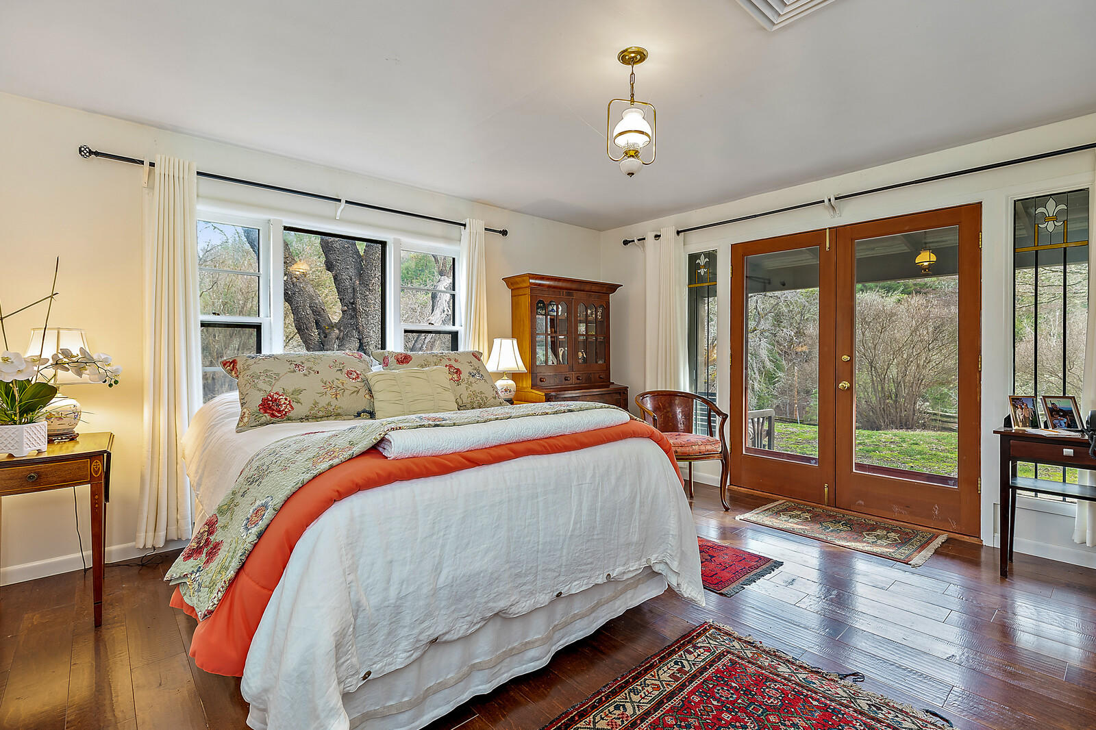 2128 Anderson Creek Road Talent, OR 97540 - Photo 66 of 87 a bedroom with a bed and wooden floor