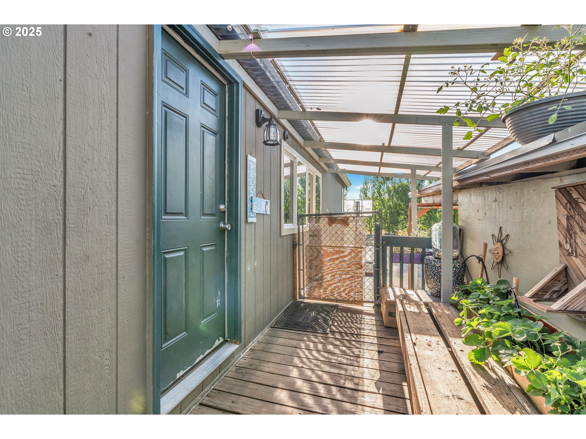 5885 Northeast Jacobson Street, Unit 70 Hillsboro, OR 97124 - Photo 4 of 29 a view of entryway with a patio