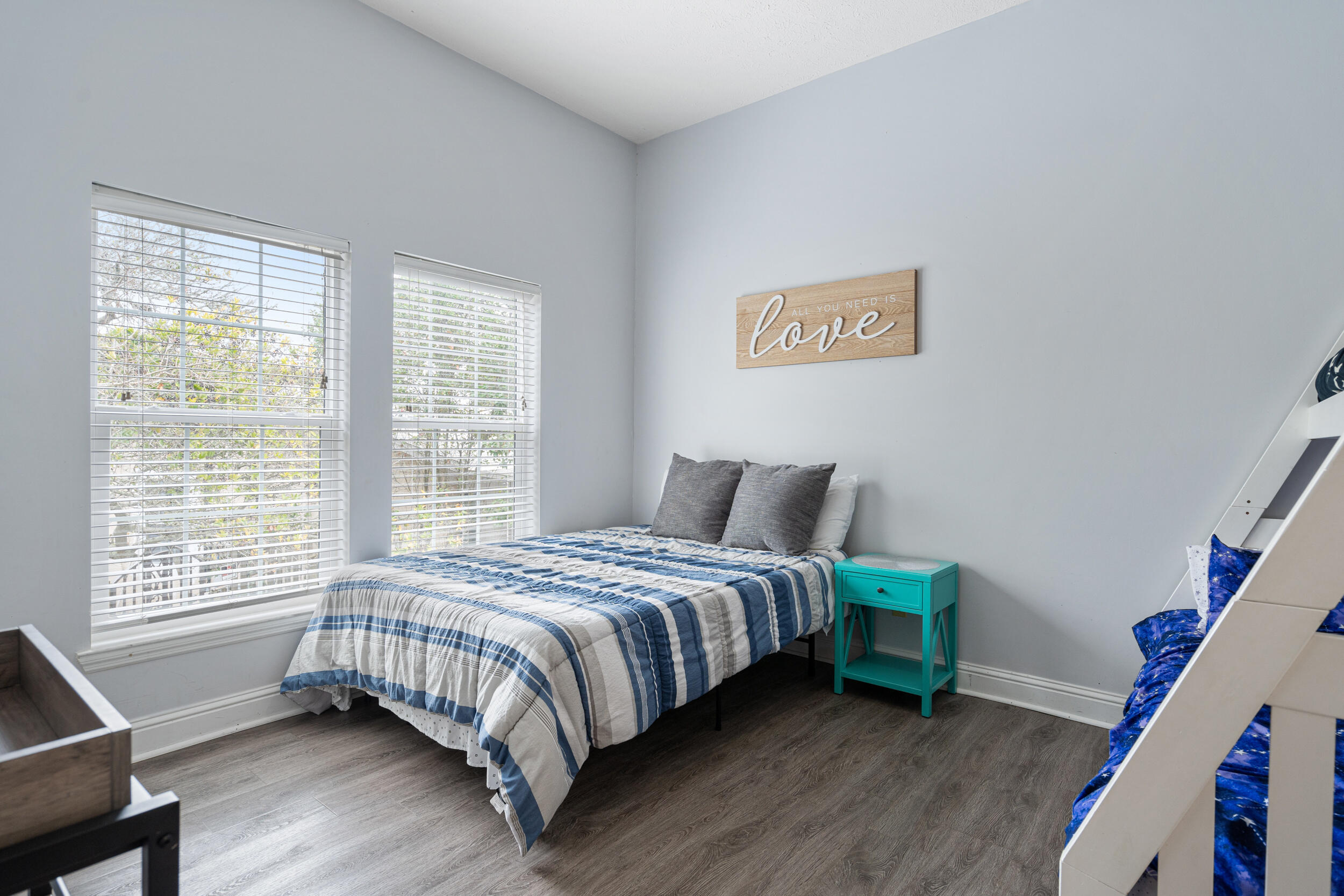 17878 Front Beach Road, Unit E2 Panama City Beach, FL 32413 - Photo 13 of 34 a bedroom with a bed and a window