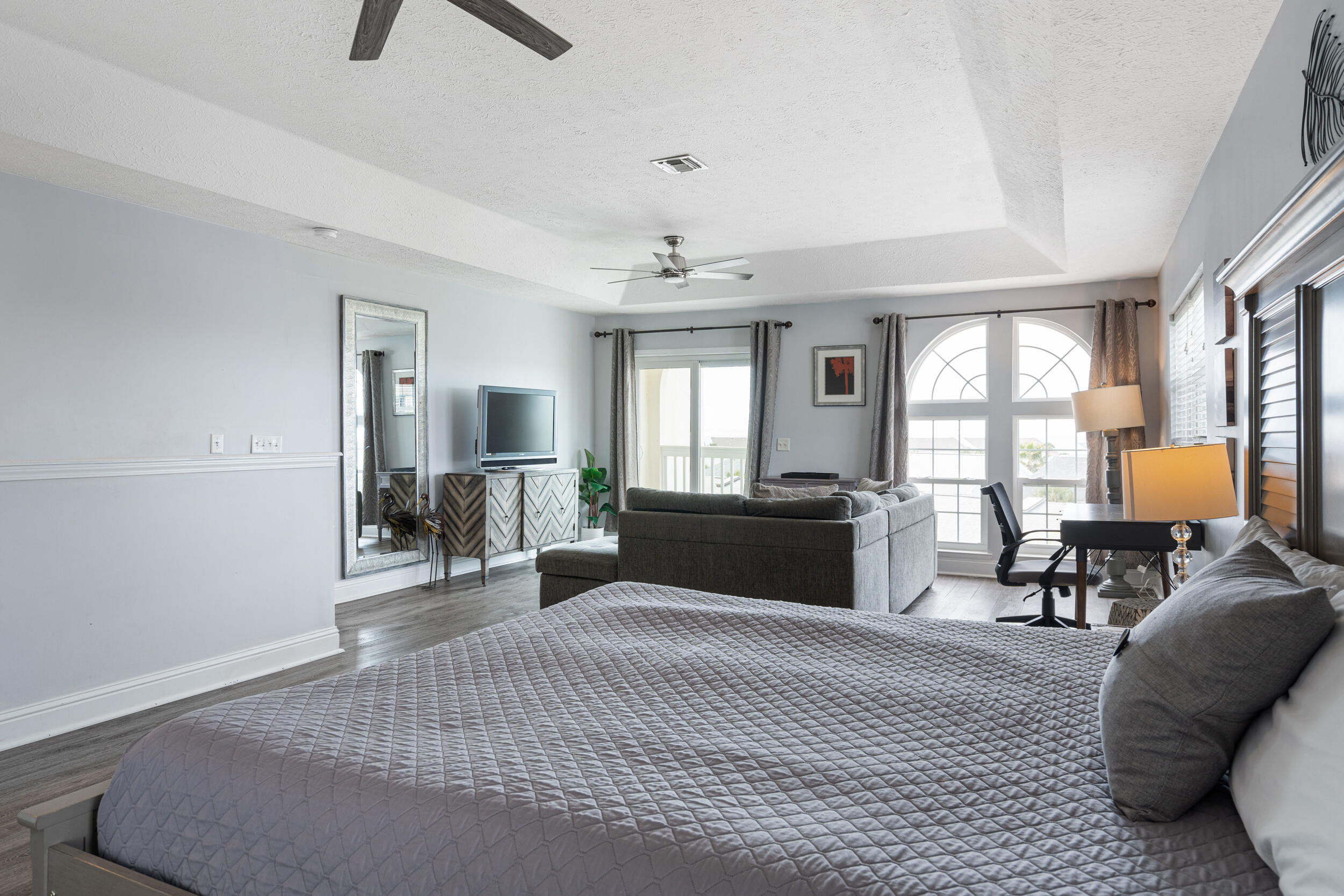 17878 Front Beach Road, Unit E2 Panama City Beach, FL 32413 - Photo 18 of 34 a living room with furniture and a window