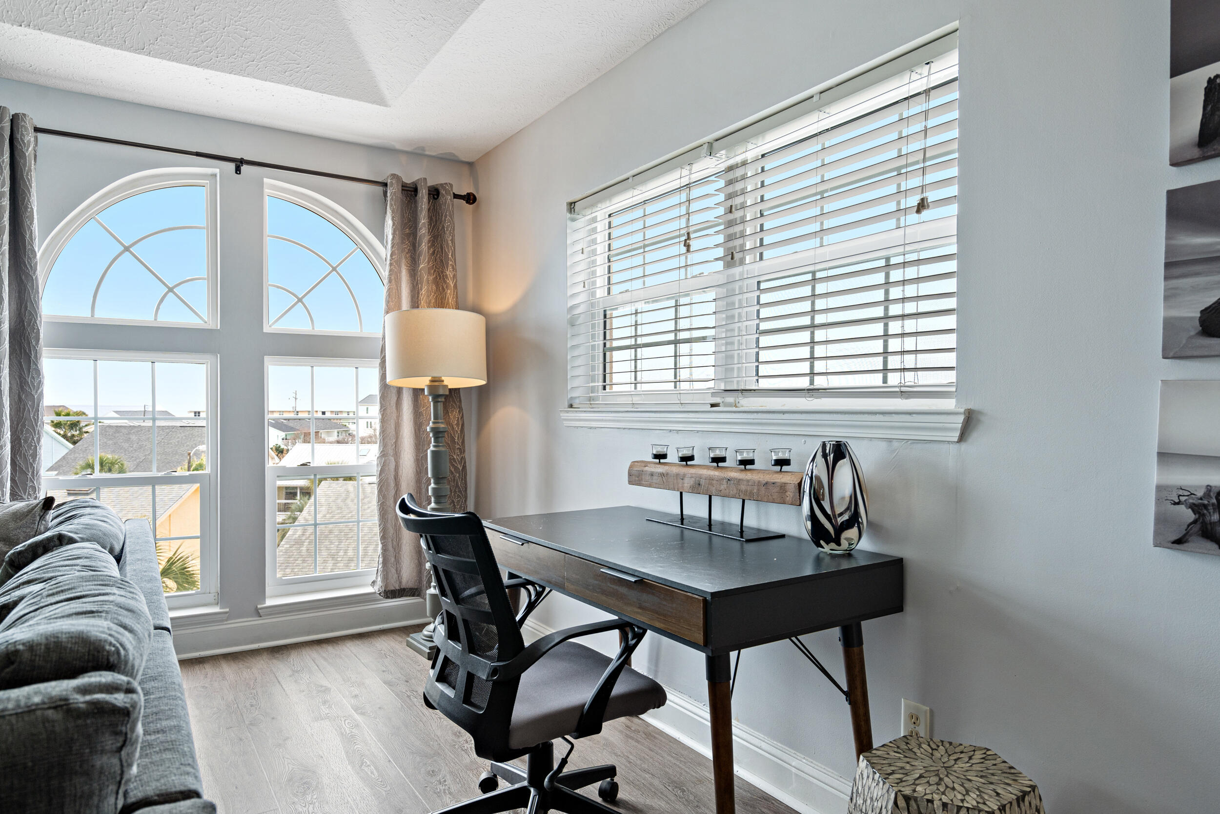 17878 Front Beach Road, Unit E2 Panama City Beach, FL 32413 - Photo 25 of 34 a workspace with furniture and a window