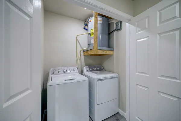 a utility room with dryer and washer