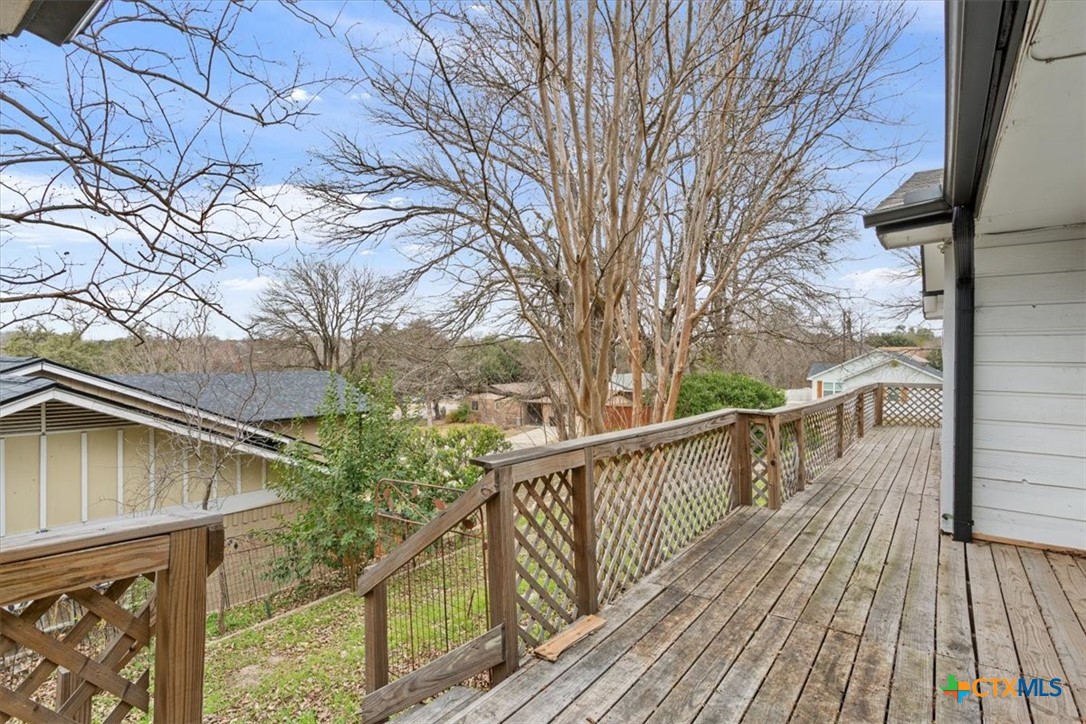 4005 Trailwood Drive Temple, TX 76502 - Photo 28 of 31 a view of balcony with wooden floor and fence
