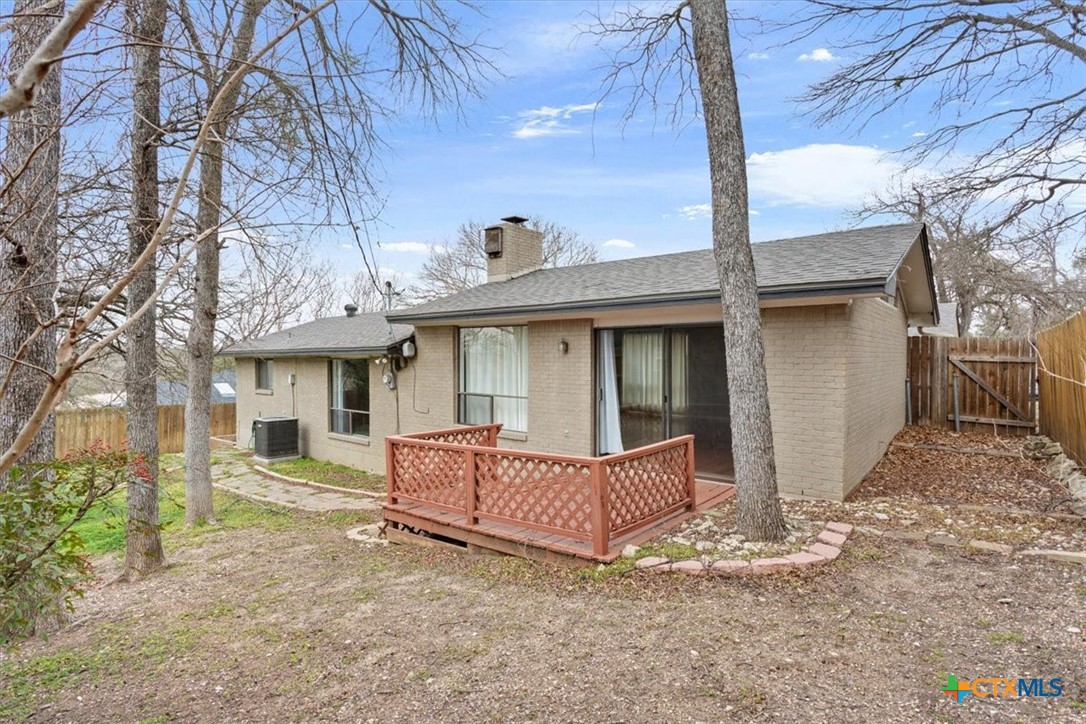 4005 Trailwood Drive Temple, TX 76502 - Photo 29 of 31 a view of a house with a yard and sitting area