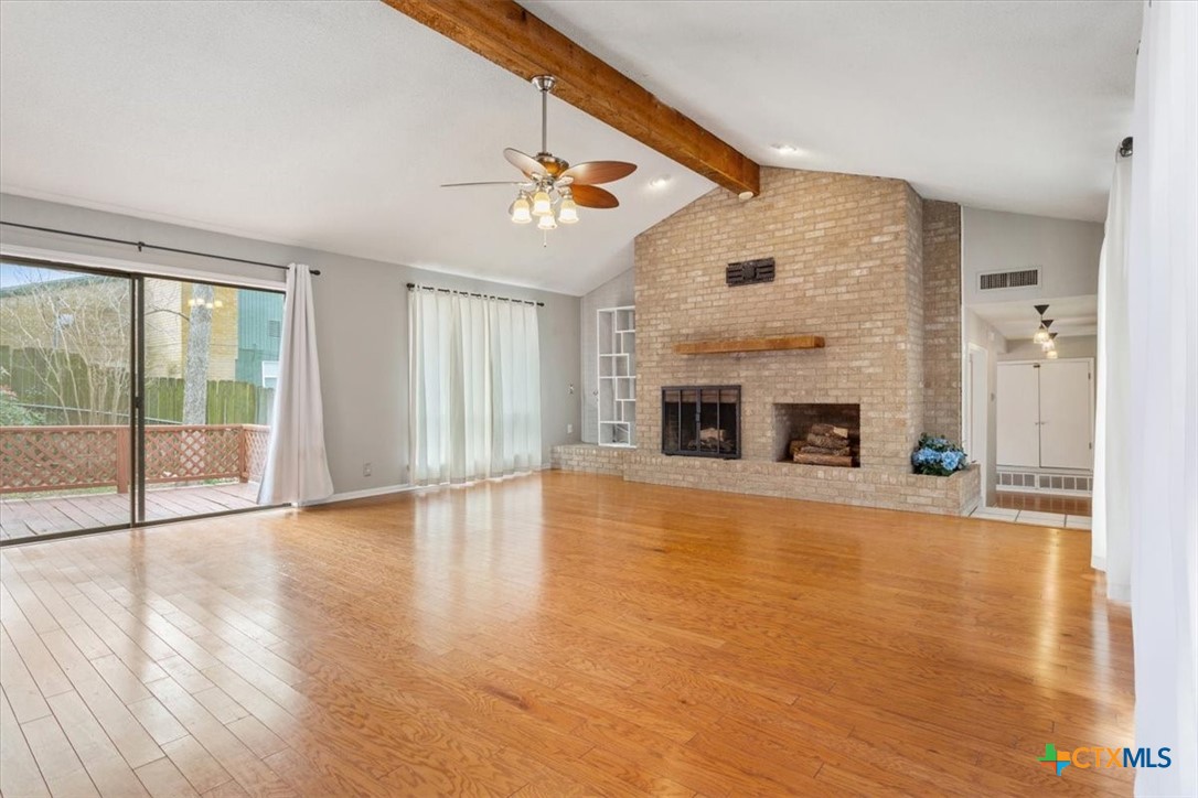 4005 Trailwood Drive Temple, TX 76502 - Photo 6 of 31 a view of an empty room with glass door and a window