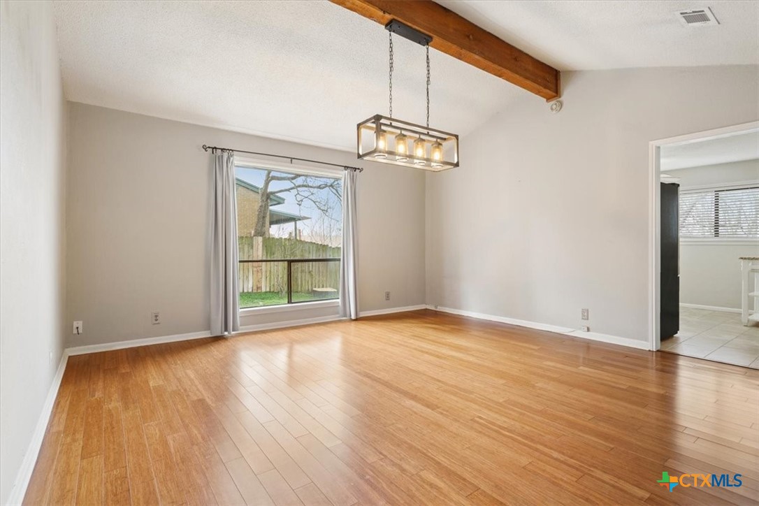 4005 Trailwood Drive Temple, TX 76502 - Photo 9 of 31 a view of empty room with wooden floor and fan