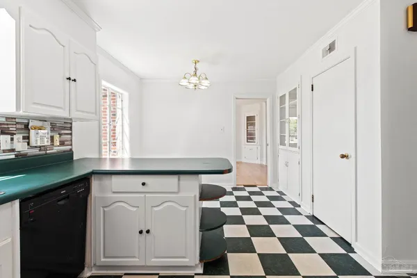 a view of a bedroom with a window