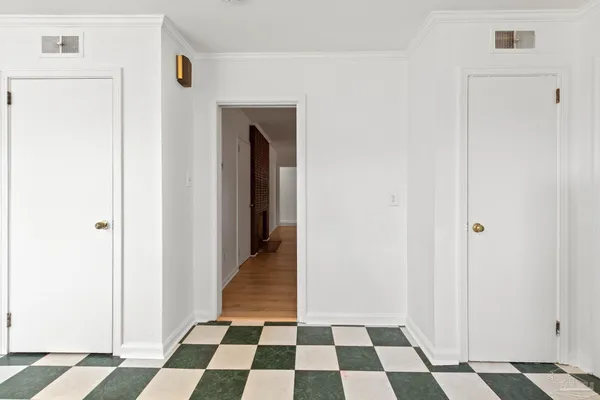 a black and white checkered floor with a black white checkered floor