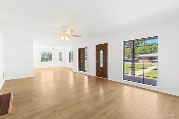 a view of an empty room with a window