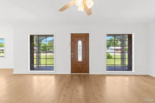 an empty room with windows