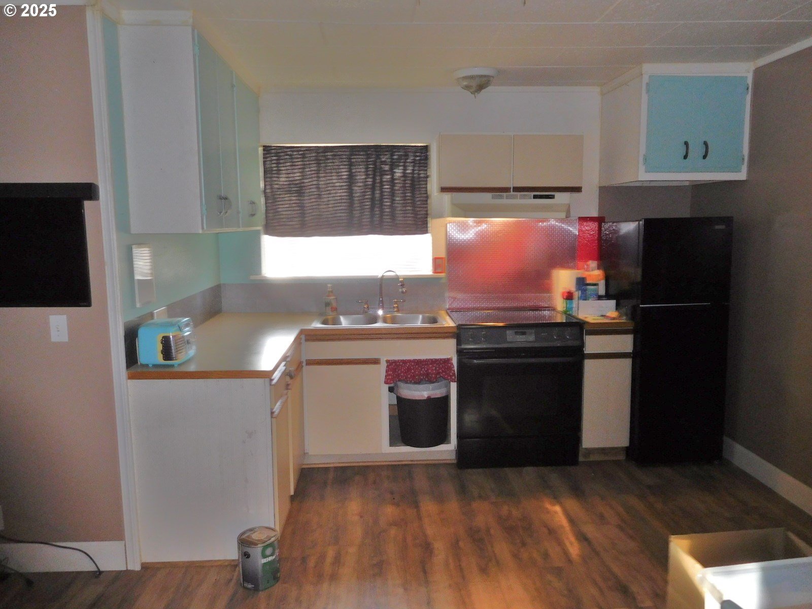 315 West Washington Street Athena, OR 97813 - Photo 12 of 25 a kitchen with stainless steel appliances a stove a sink and a refrigerator