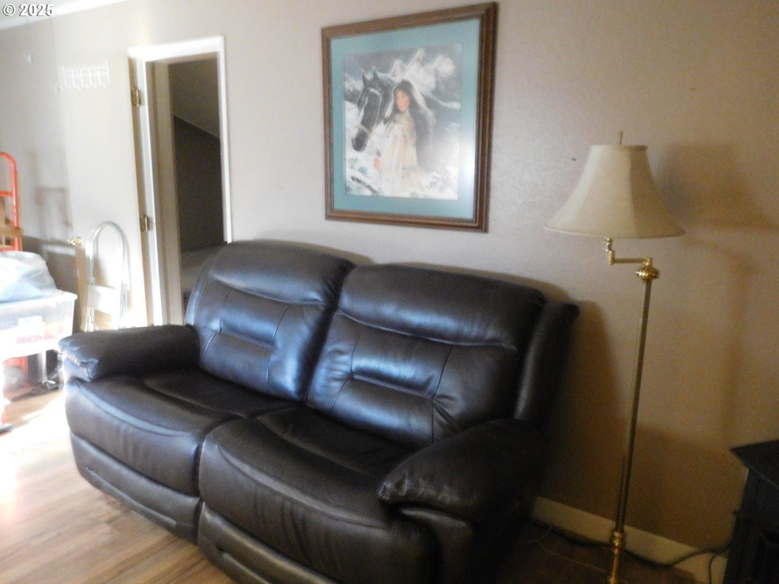 315 West Washington Street Athena, OR 97813 - Photo 14 of 25 a living room with furniture and a painting on the wall