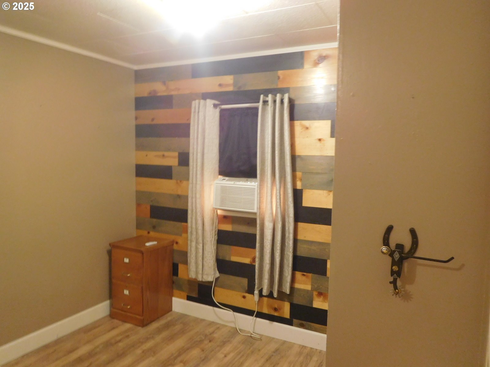 315 West Washington Street Athena, OR 97813 - Photo 18 of 25 a view of a room with wooden floor