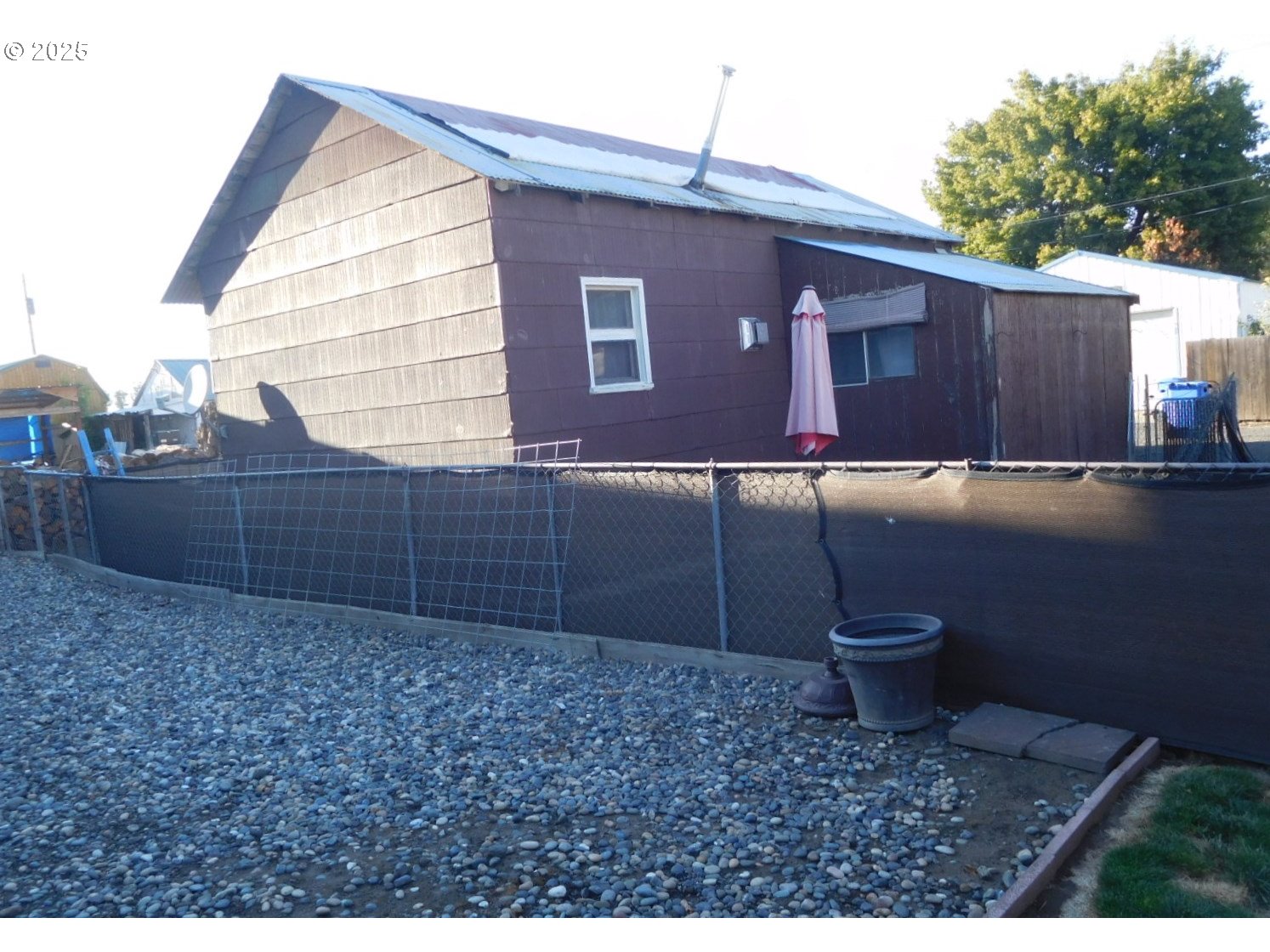 315 West Washington Street Athena, OR 97813 - Photo 9 of 25 a view of a backyard of the house