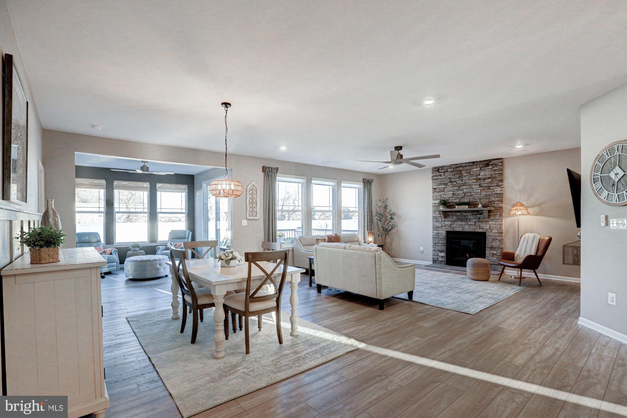507 Cherry Bark Road Middletown, DE 19709 - Photo 24 of 81 a view of a dining room with furniture window and wooden floor