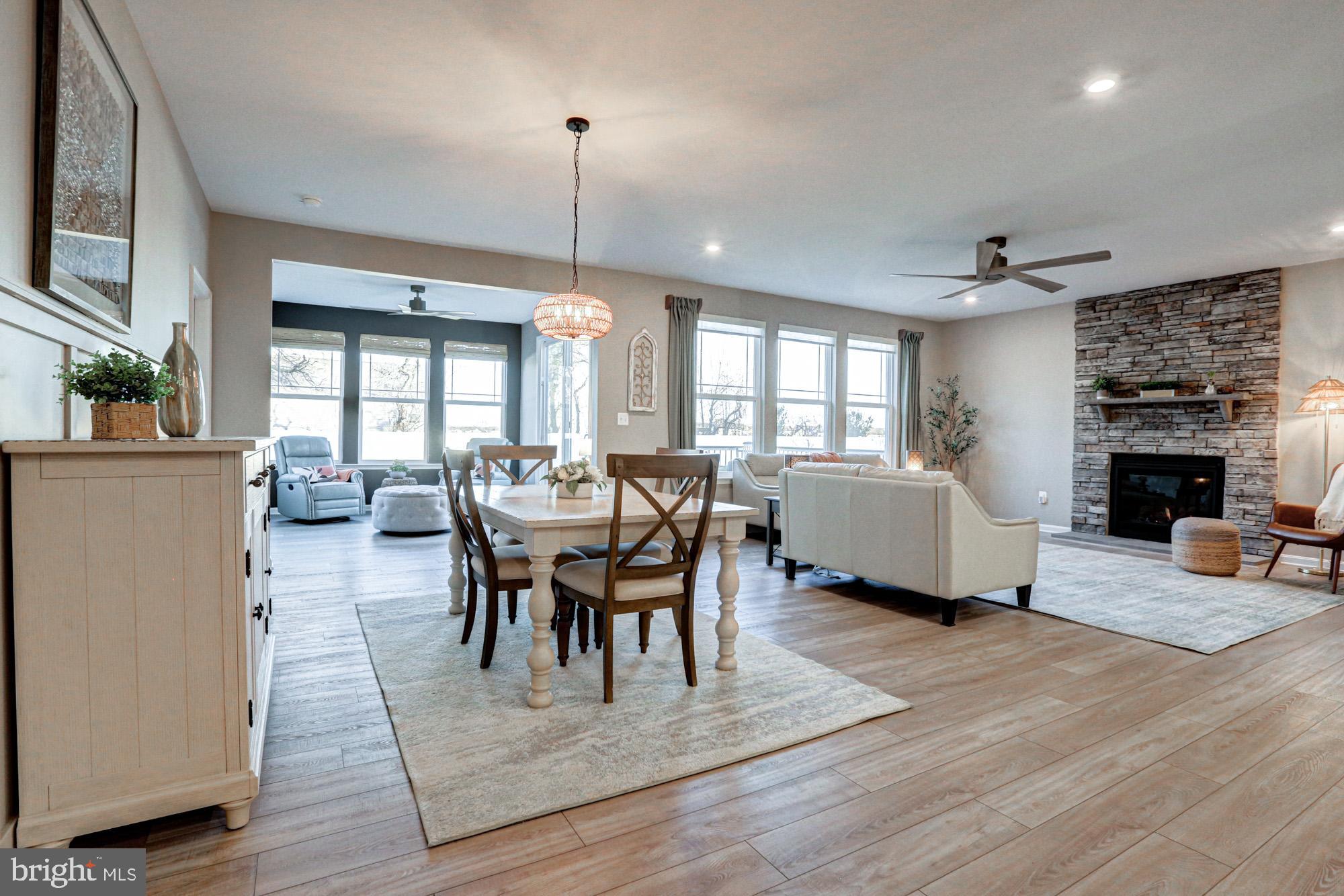 507 Cherry Bark Road Middletown, DE 19709 - Photo 27 of 81 a view of a dining room with furniture window and wooden floor