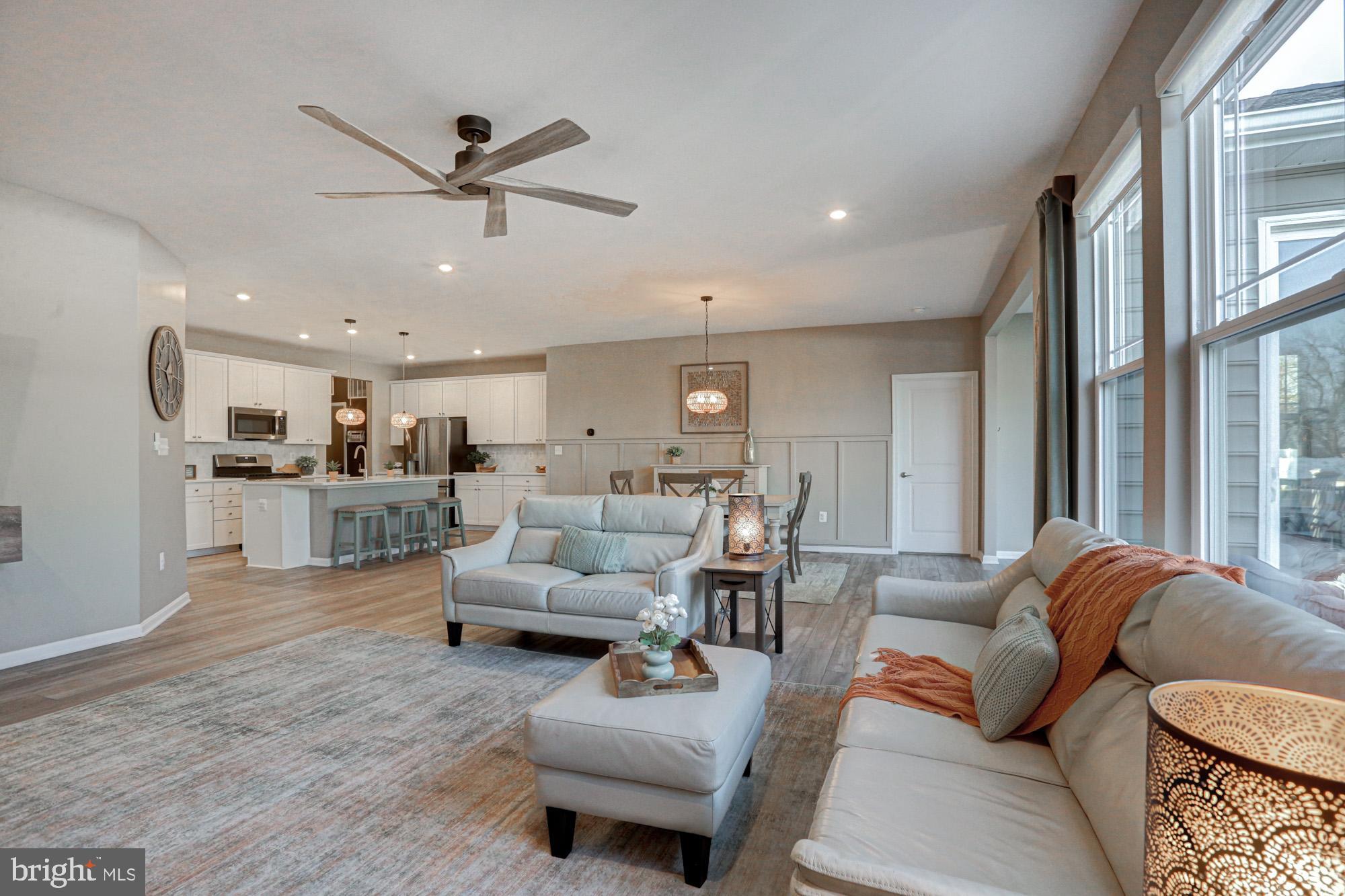 507 Cherry Bark Road Middletown, DE 19709 - Photo 29 of 81 a living room with furniture and a large window